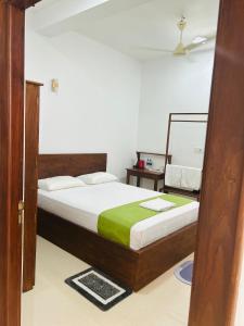 Jaffna City Palace Hotel客房内的一张或多张床位