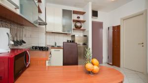 Kuchyň nebo kuchyňský kout v ubytování Apartment Di Anima