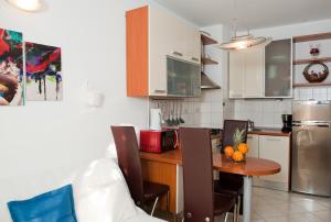 Kuchyň nebo kuchyňský kout v ubytování Apartment Di Anima