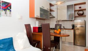 Kuchyň nebo kuchyňský kout v ubytování Apartment Di Anima