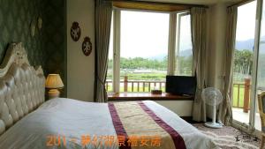 Foto de la galeria de 雲山水民宿逸翠軒會館 a Fengping