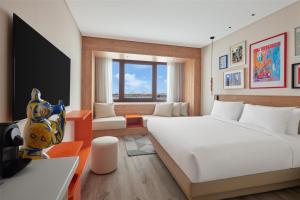 Postel nebo postele na pokoji v ubytování Hyatt Centric Cairo West