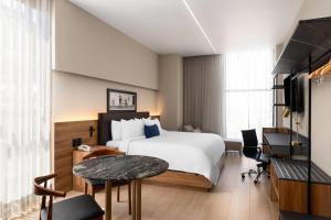 Postel nebo postele na pokoji v ubytování TRYP By Wyndham Ciudad Guzmán UTTSA + 26 fotografií