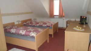 Postel nebo postele na pokoji v ubytování Hotel Eigelstein