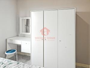 Stylish 2BR MOI Apt with Pool, Gym, Wi-Fi客房内的一张或多张床位