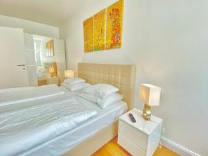 Posteľ alebo postele v izbe v ubytovaní Steiner Residences Vienna Nestroyplatz