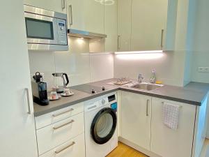 Kuchyňa alebo kuchynka v ubytovaní Steiner Residences Vienna Nestroyplatz