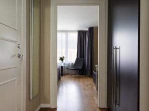 Postel nebo postele na pokoji v ubytování Elite Stadshotellet Västerås