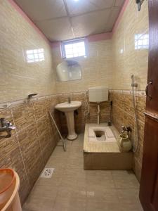 a bathroom with a sink and a toilet at 2 Bedrooms innara Rooms Bhurban A1 in Bhurban