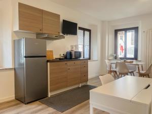 Η κουζίνα ή μικρή κουζίνα στο Al Campanile Suite