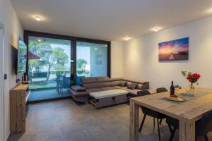 Et opholdsområde på Fortuna Deluxe Apartment