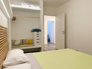 Ένα ή περισσότερα κρεβάτια σε δωμάτιο στο Al Campanile Suite