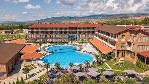 an aerial view of a resort with a large swimming pool at Villa Ambassadori Kachreti Golf Resort, Kakheti Kachreti in Kachretʼi