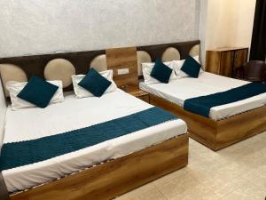 Ένα ή περισσότερα κρεβάτια σε δωμάτιο στο Sharma's BNB