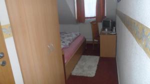 Postel nebo postele na pokoji v ubytování Hotel Eigelstein