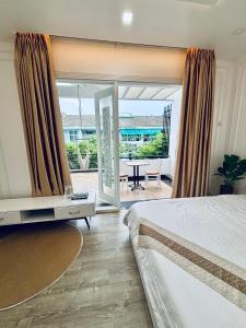 Ένα ή περισσότερα κρεβάτια σε δωμάτιο στο Minh Anh Homestay 3