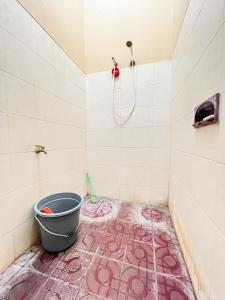 Koupelna v ubytování Homestay Uti Maguwoharjo + 23 fotografií