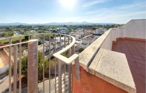 a balcony with a view of a city at Awesome Apartment In Bellreguard in Bellreguart