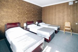 Postel nebo postele na pokoji v ubytování Hotel Rosa