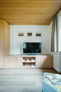 a living room with a flat screen tv at Haus Margreth in Mellau