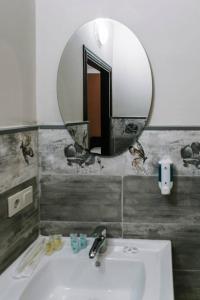 Koupelna v ubytování Hotel Rosa