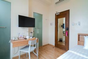 TV a/nebo společenská místnost v ubytování MySpace Hotel Comembo Taguig
