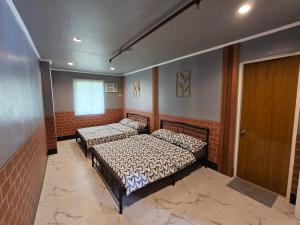 Postel nebo postele na pokoji v ubytování Ciello Accomodation