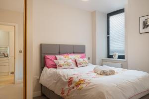 Ένα ή περισσότερα κρεβάτια σε δωμάτιο στο Charming Comfortable Flat - PassTheKeys