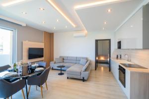 Televízia a/alebo spoločenská miestnosť v ubytovaní MyFlat Casa Galerius Apartment