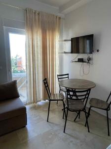 TV a/nebo společenská místnost v ubytování Appartement Sou