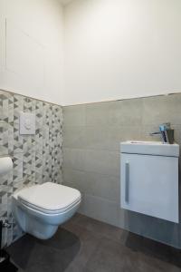 Kúpeľňa v ubytovaní MyFlat Casa Galerius Apartment