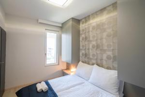 Posteľ alebo postele v izbe v ubytovaní MyFlat Casa Galerius Apartment