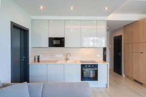 Kuchyňa alebo kuchynka v ubytovaní MyFlat Casa Galerius Apartment