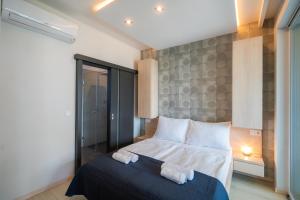 Posteľ alebo postele v izbe v ubytovaní MyFlat Casa Galerius Apartment + 37 fotografií