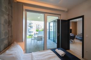 Posteľ alebo postele v izbe v ubytovaní MyFlat Casa Galerius Apartment