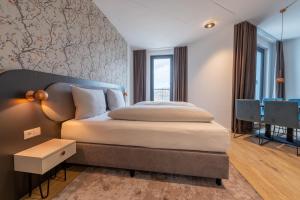 MASEVEN Frankfurt Messe客房内的一张或多张床位