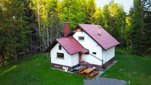 an aerial view of a house with a red roof at House Angelca in Hočko Pohorje