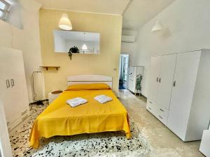 Postel nebo postele na pokoji v ubytování Scauri Holiday