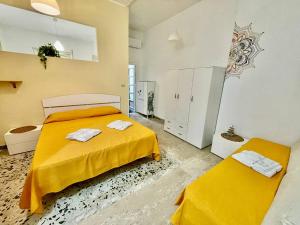 Postel nebo postele na pokoji v ubytování Scauri Holiday