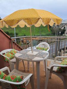 En balkon eller terrasse på Ático en Ribeira Ría de Arousa