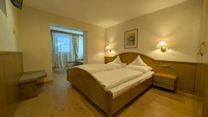 Postel nebo postele na pokoji v ubytování Hotel Zebru