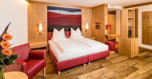 Postel nebo postele na pokoji v ubytování Hotel Hasslhof