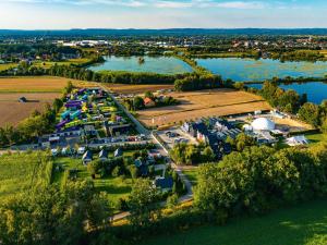 an aerial view of a campgrounds next to a river at SCANDINAVIA Resort in Zator