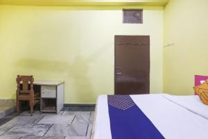 Postel nebo postele na pokoji v ubytování Hotel O Hr Residency