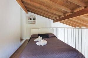 Giường trong phòng chung tại Tata's Home +14 ảnh