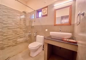 Koupelna v ubytování Solaris Beach View Resort & Spa by VOYE HOMES
