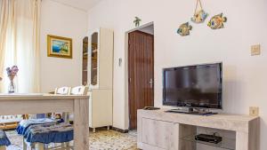 Gallery image of Casa Baia Chiara, air-con, fronte spiaggia in Cala Gonone