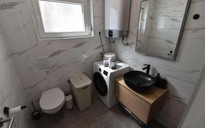Koupelna v ubytování Apartment Lika + 12 fotografií