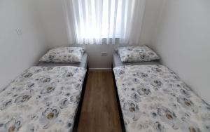 Postel nebo postele na pokoji v ubytování Apartment Lika