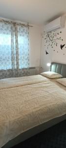 Posteľ alebo postele v izbe v ubytovaní Entrance 2 Stay